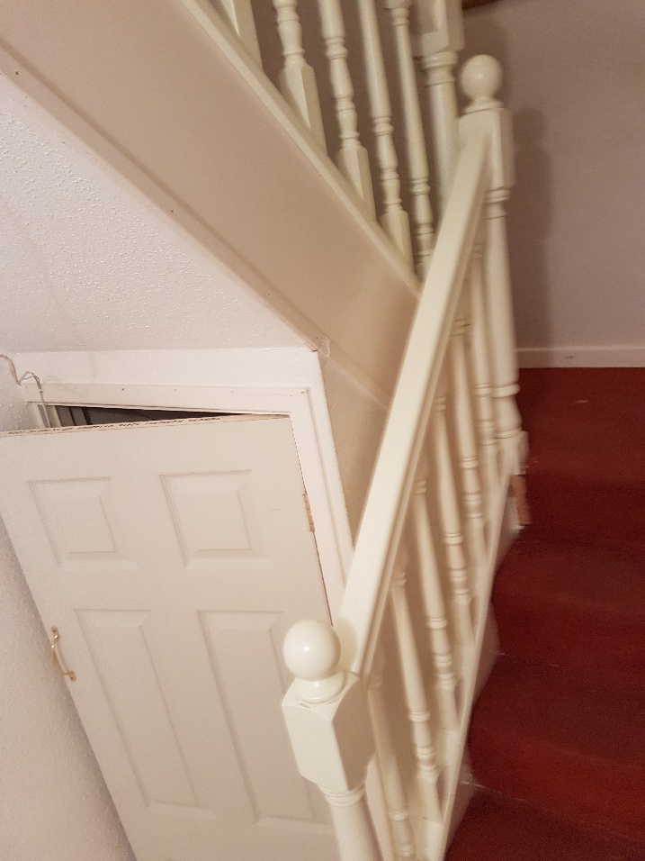 White banisters on two-level stairs.